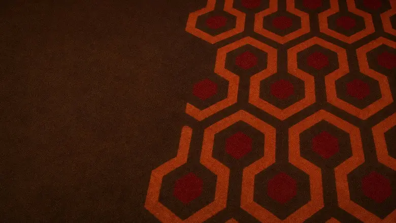 Danny seen from above on the patterned carpet in The Shining
