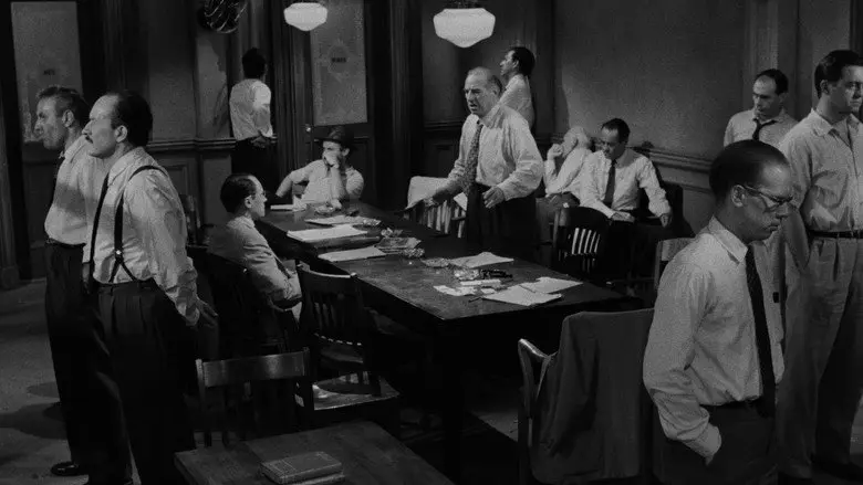 Jurors argue around the table in 12 Angry Men