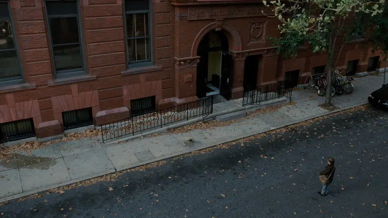 A solitary figure seen from above on a city street in The Sixth Sense